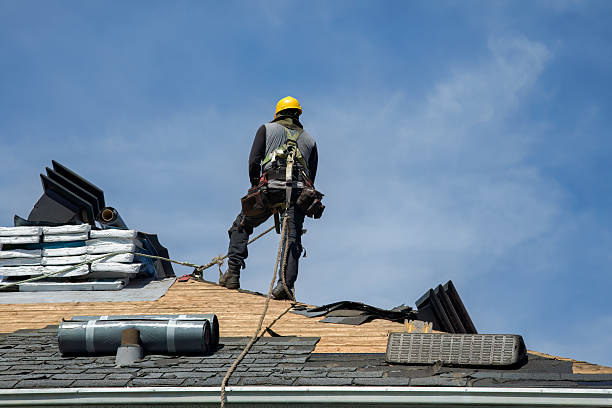 Professional Gutter Installation technician working in Houghton Lake, MI